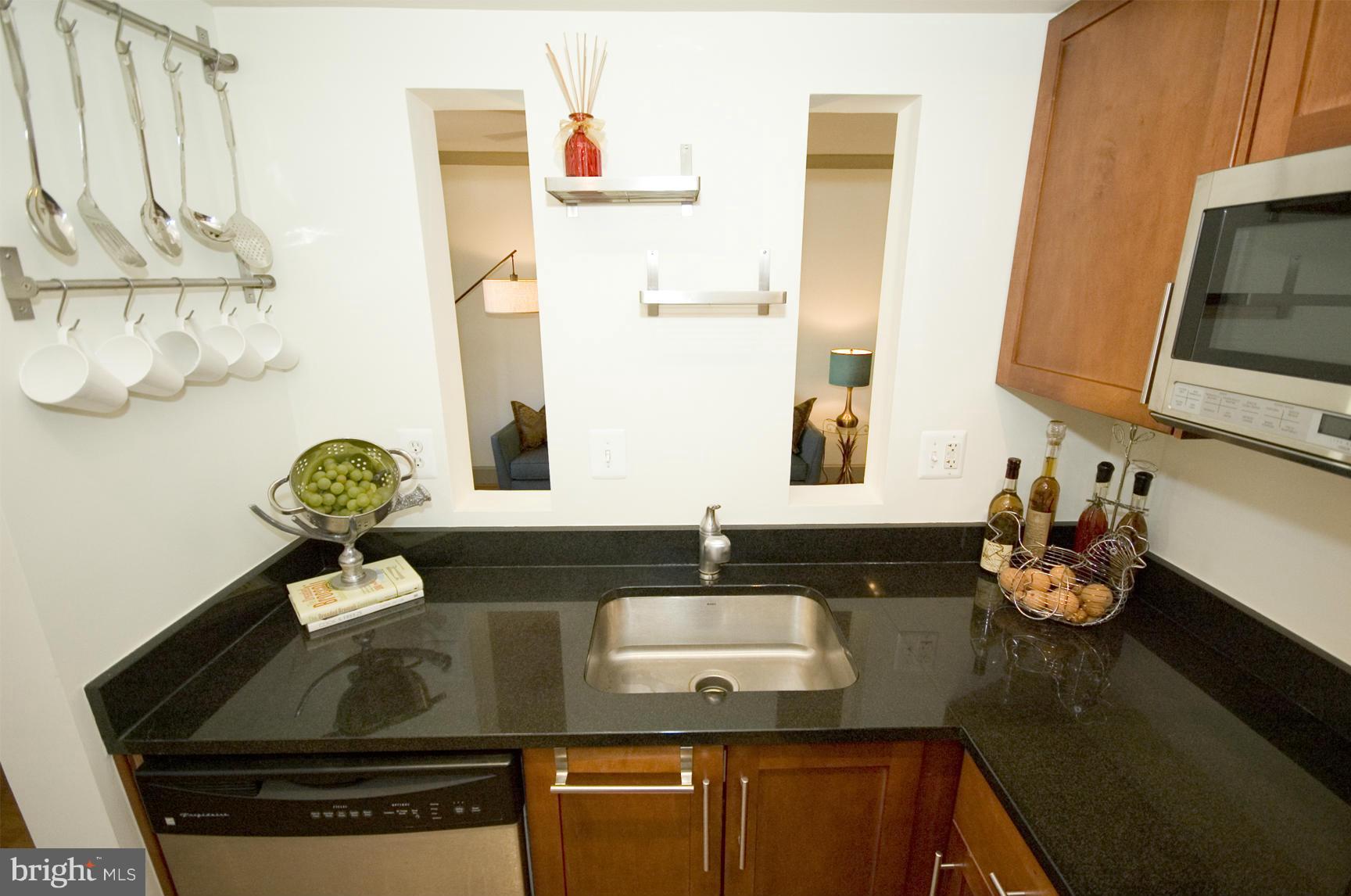 1363 K Street Southeast, Unit 103 Washington, DC 20003 - Photo 8 of 20 Granite counters, pass through