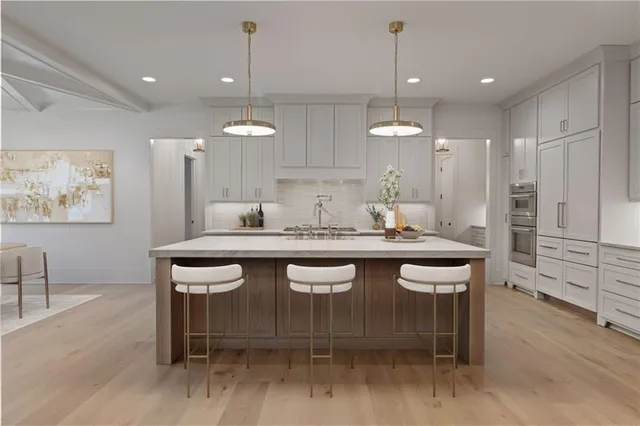 a dining table with chairs and wooden floor