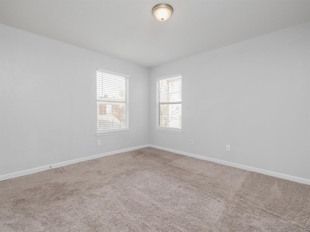 3004 Speedway, Unit 6 Austin, TX 78705 - Photo 16 of 25 an empty room with windows