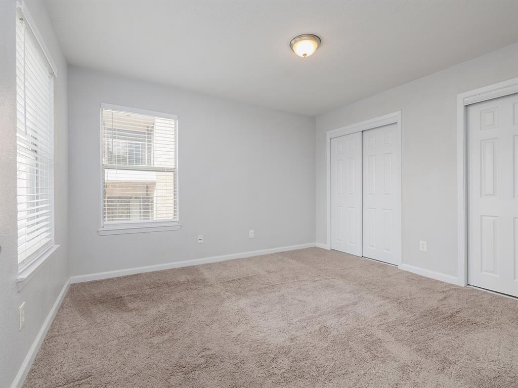 3004 Speedway, Unit 6 Austin, TX 78705 - Photo 17 of 25 a view of an empty room with a window