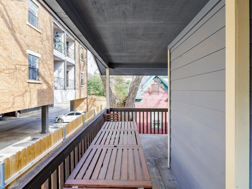 3004 Speedway, Unit 6 Austin, TX 78705 - Photo 20 of 25 a view of balcony with wooden floor and iron gate