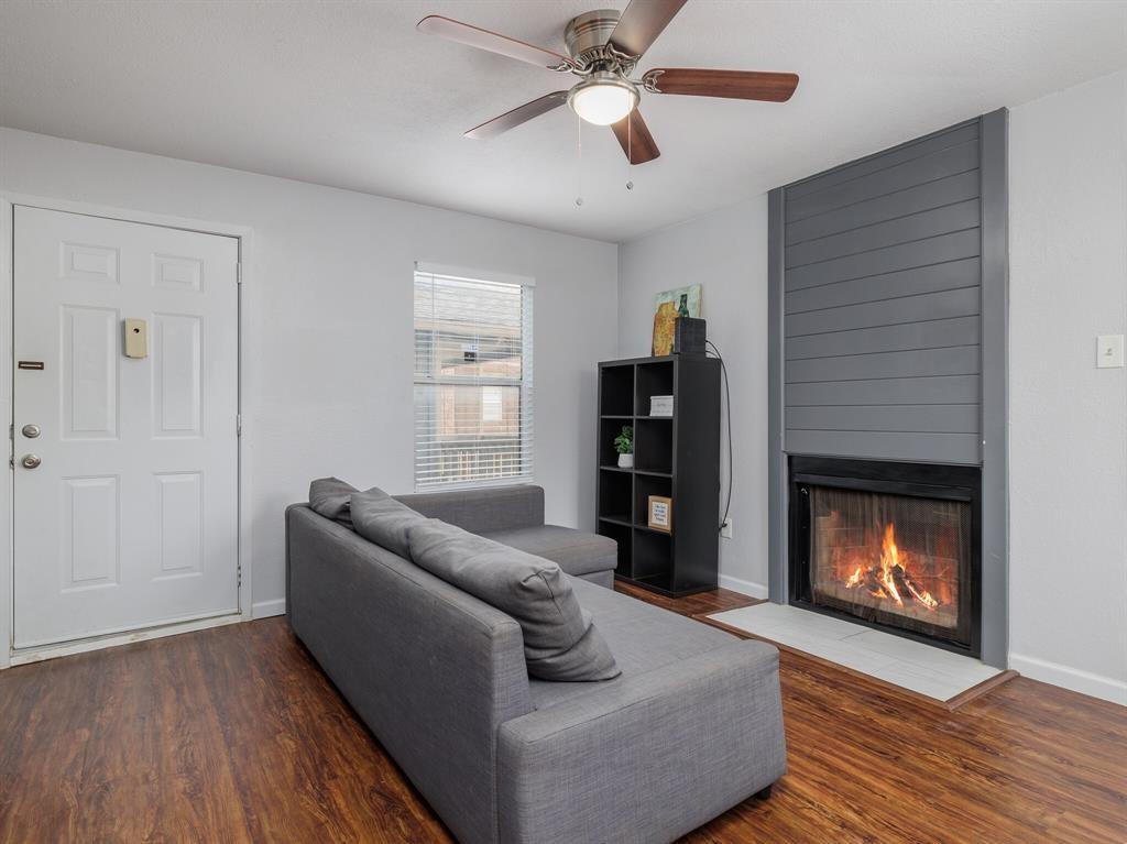 3004 Speedway, Unit 6 Austin, TX 78705 - Photo 4 of 25 a living room with furniture and a fireplace