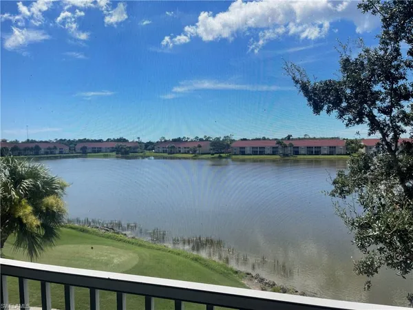 a view of a lake from a yard