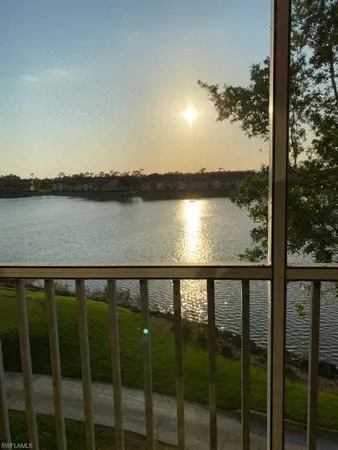 a view of a lake from a balcony