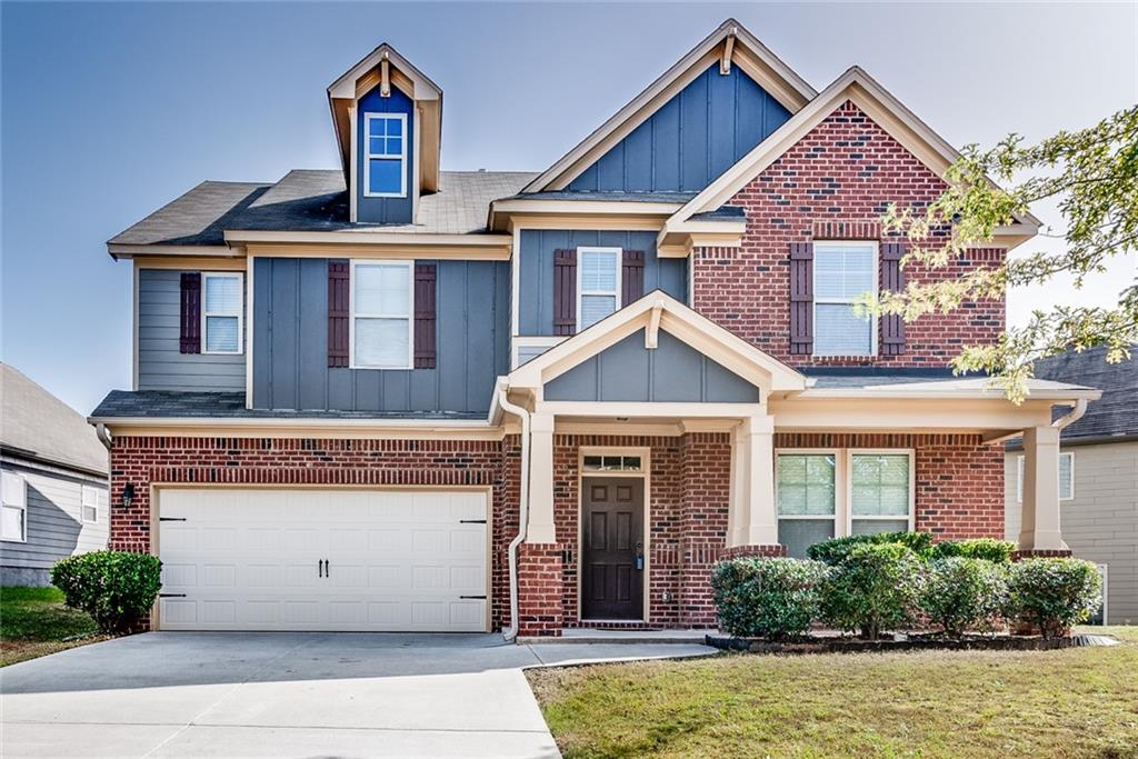 396 Highbranch Circle Lawrenceville, GA 30044 - Photo 1 of 1 a front view of a house with a yard