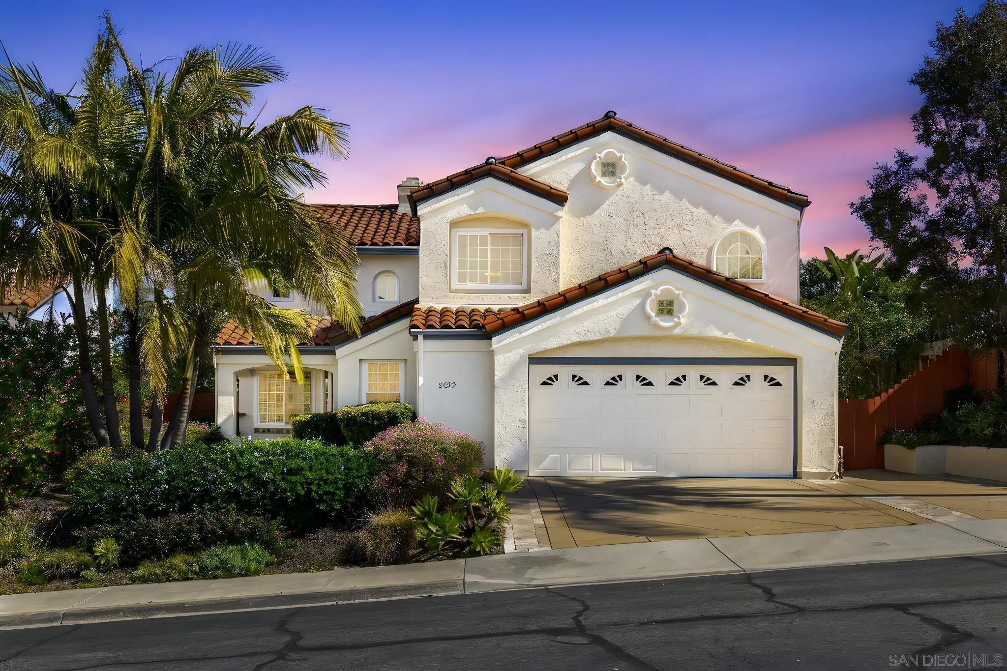 5029 Viewridge Way Oceanside, CA 92056 - Photo 1 of 31 a front view of a house with a yard and garage