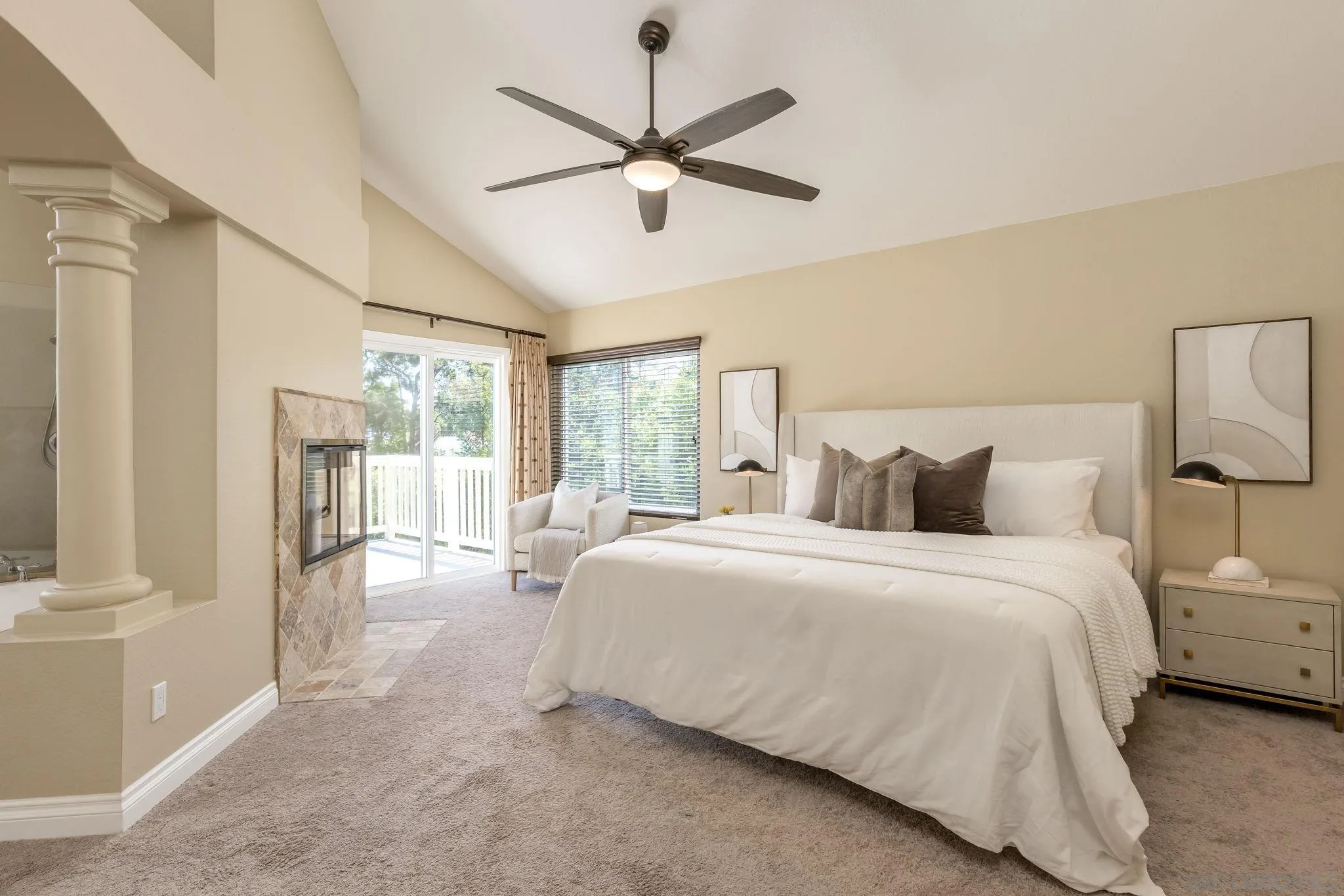 5029 Viewridge Way Oceanside, CA 92056 - Photo 13 of 31 a spacious bedroom with a bed and a large window