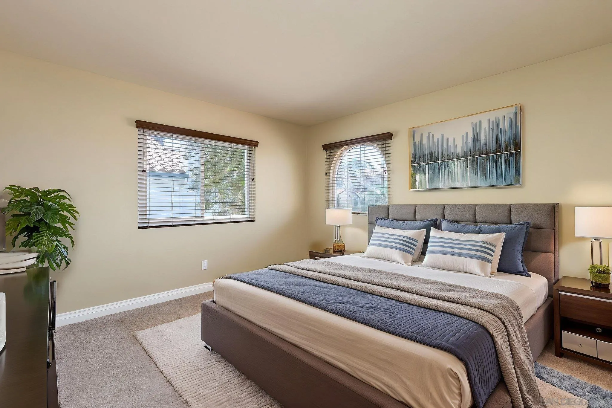 5029 Viewridge Way Oceanside, CA 92056 - Photo 17 of 31 a bedroom with bed and window