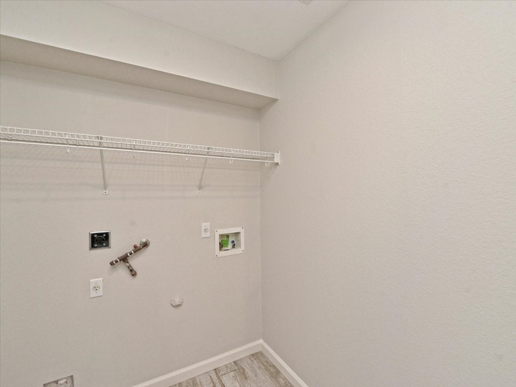 17816 Cutback Drive Manor, TX 78653 - Photo 13 of 28 a bathroom with a shower