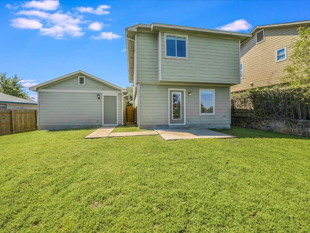 17816 Cutback Drive Manor, TX 78653 - Photo 28 of 28 a front view of a house with a yard