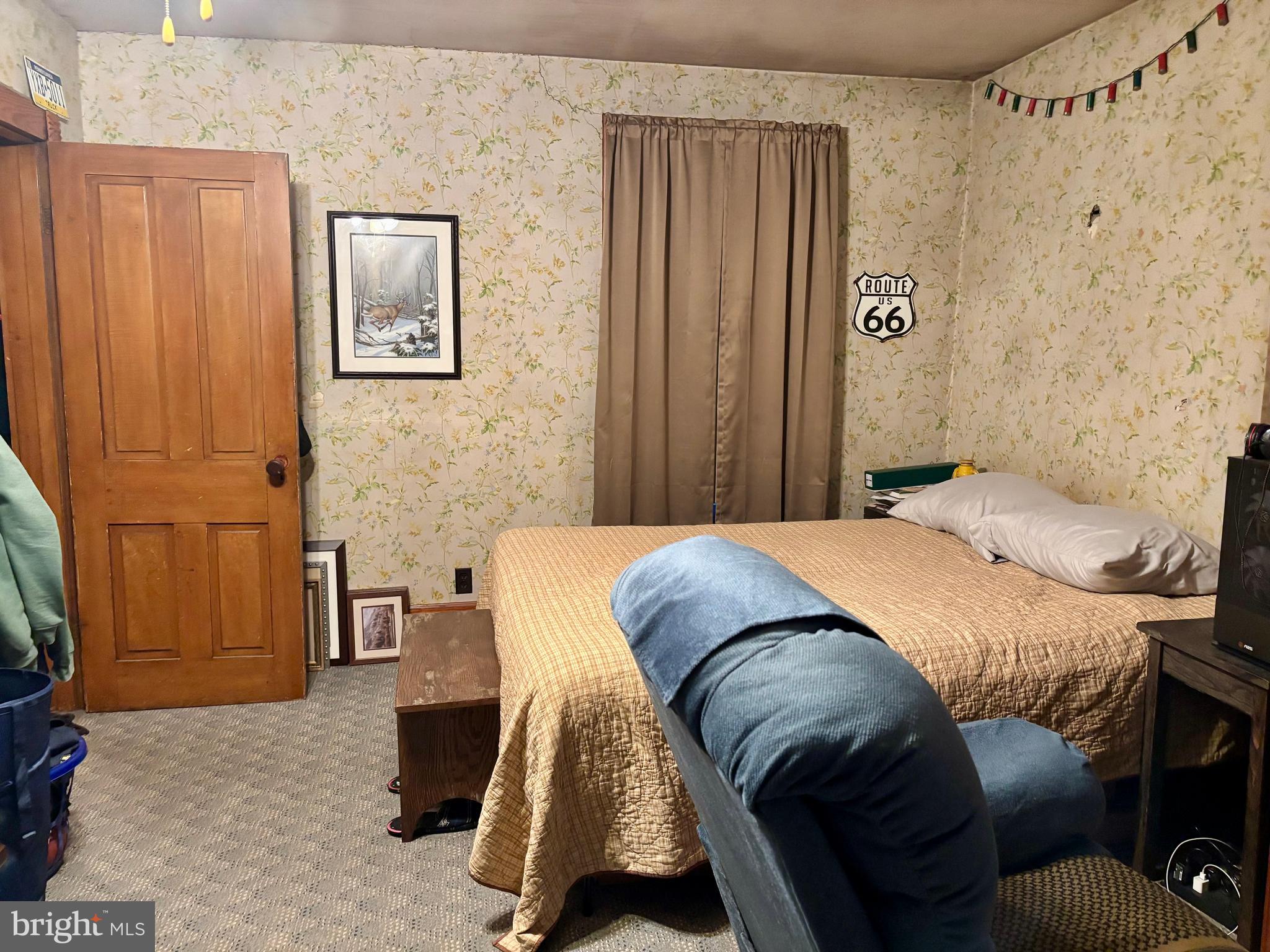 133 Black Street Howard, PA 16841 - Photo 17 of 26 a bedroom with a bed and a cabinet