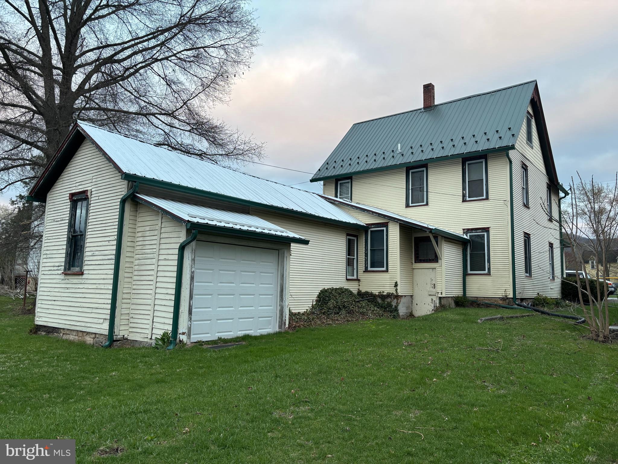 133 Black Street Howard, PA 16841 - Photo 22 of 26 a front view of a house with a garden