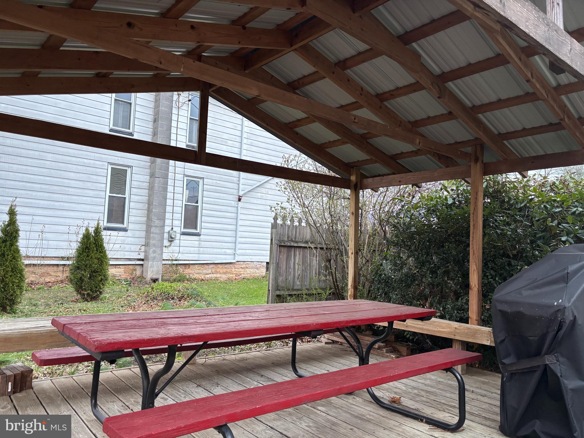 133 Black Street Howard, PA 16841 - Photo 24 of 26 a view of a patio with a table chairs and a table