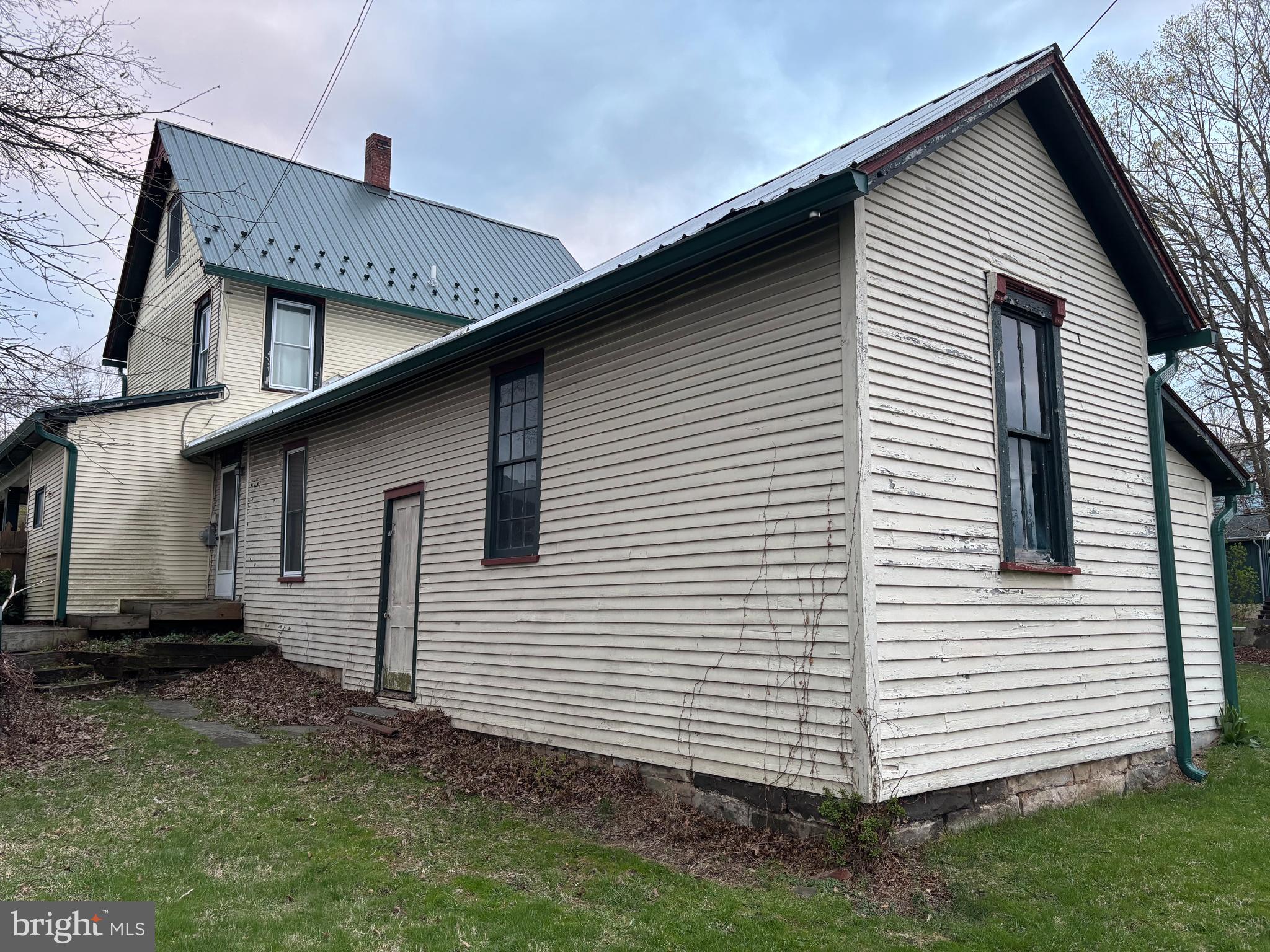 133 Black Street Howard, PA 16841 - Photo 25 of 26 a front view of a house with a yard