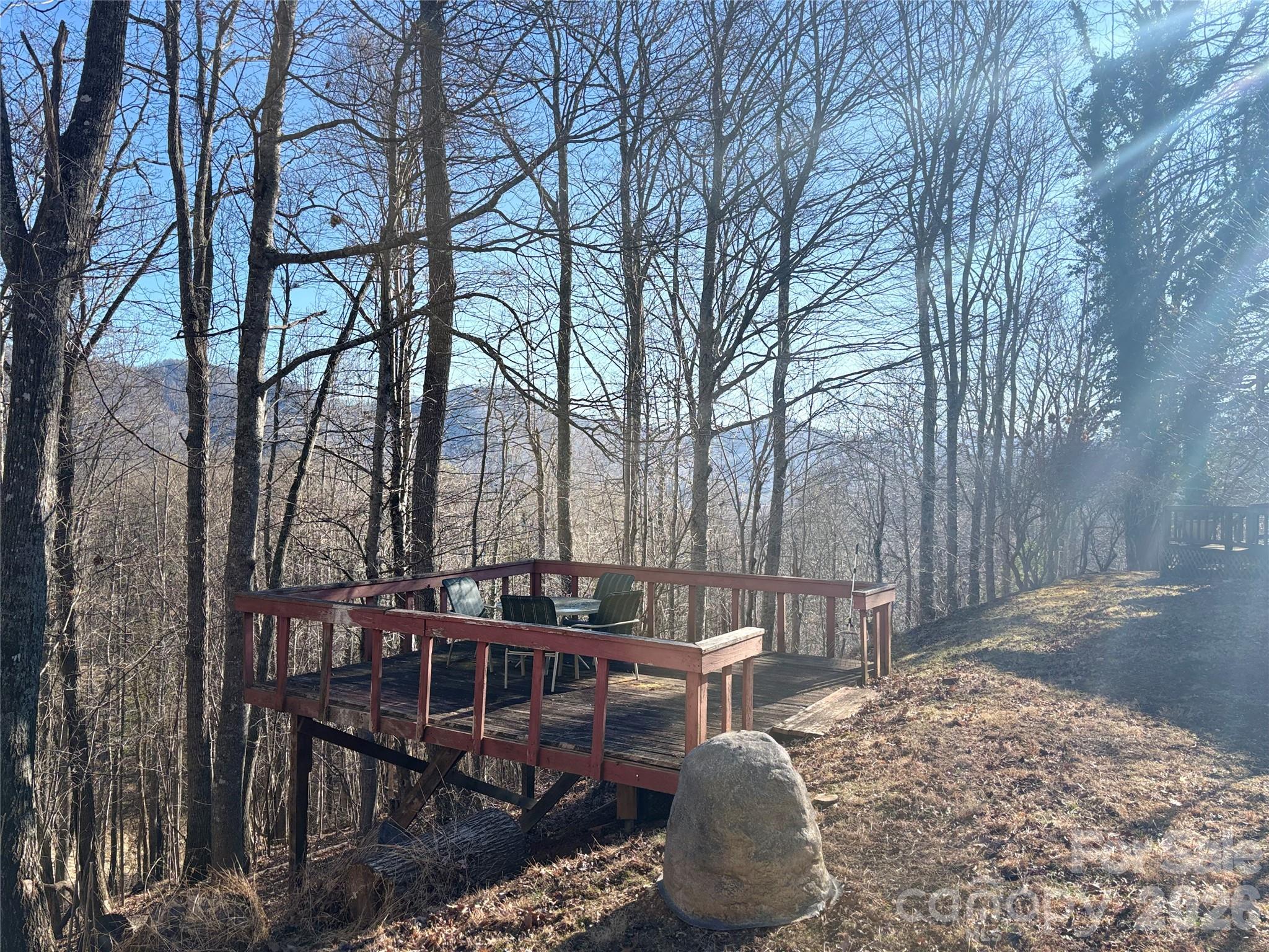 219 Rockinghorse Trail Burnsville, NC 28714 - Photo 29 of 31 a view of a patio with iron fence
