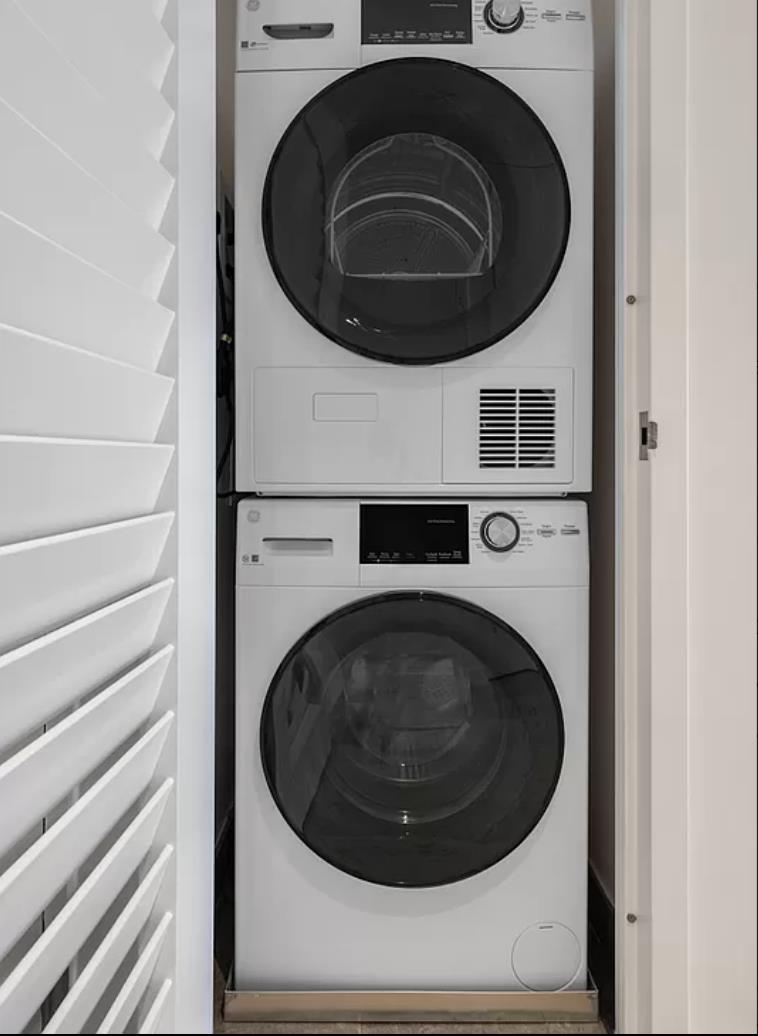 8 Spruce Street, Unit 36T Manhattan, NY 10038 - Photo 7 of 19 a close up view of washer and dryer