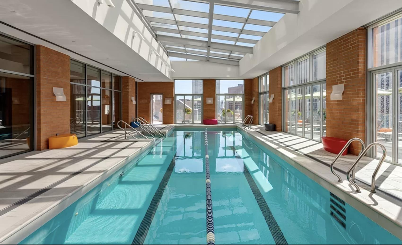 8 Spruce Street, Unit 36T Manhattan, NY 10038 - Photo 8 of 19 a view of a house with a swimming pool