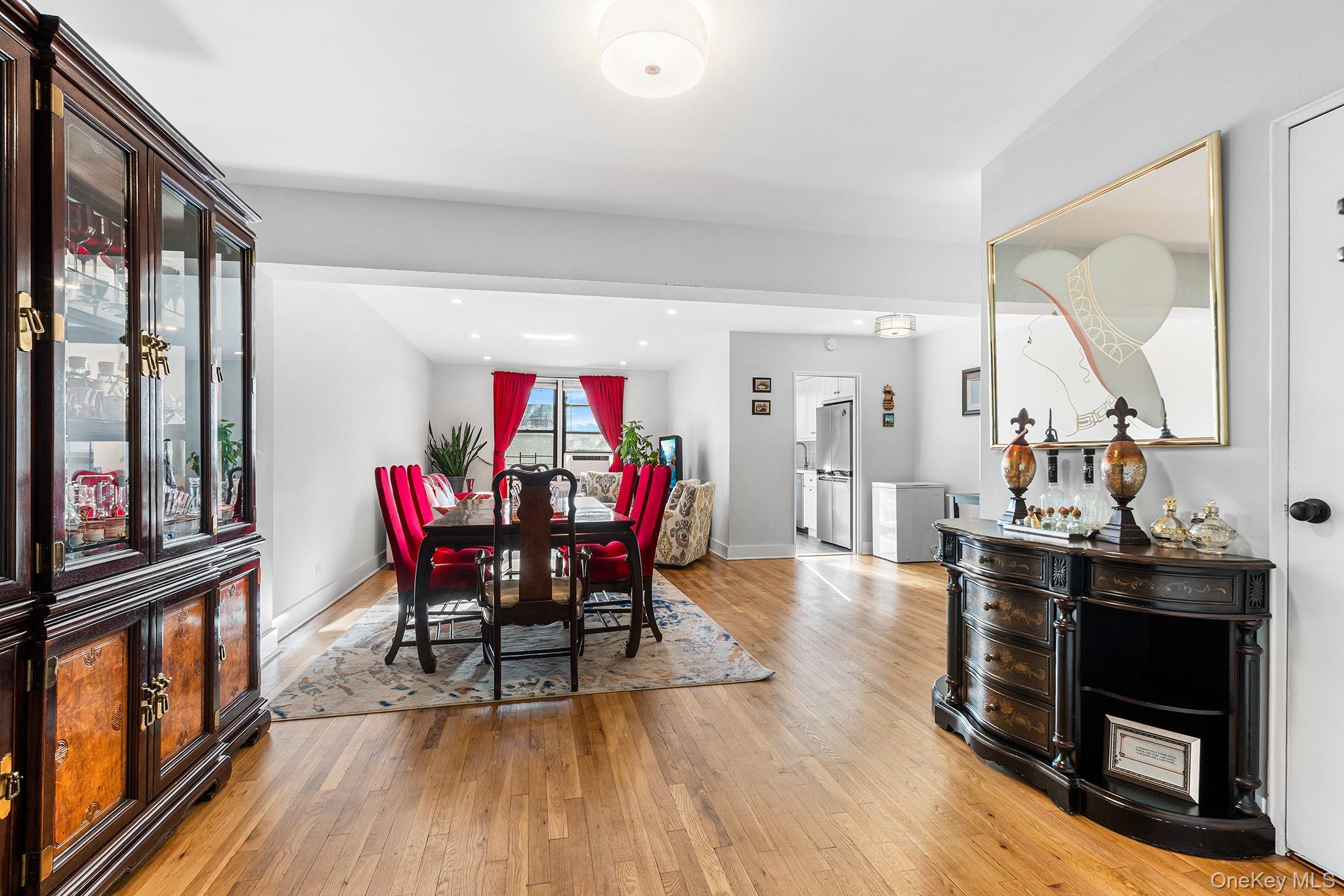 525 West 235th Street, Unit 7E Bronx, NY 10463 - Photo 5 of 14 a view of a dining room with furniture and a window