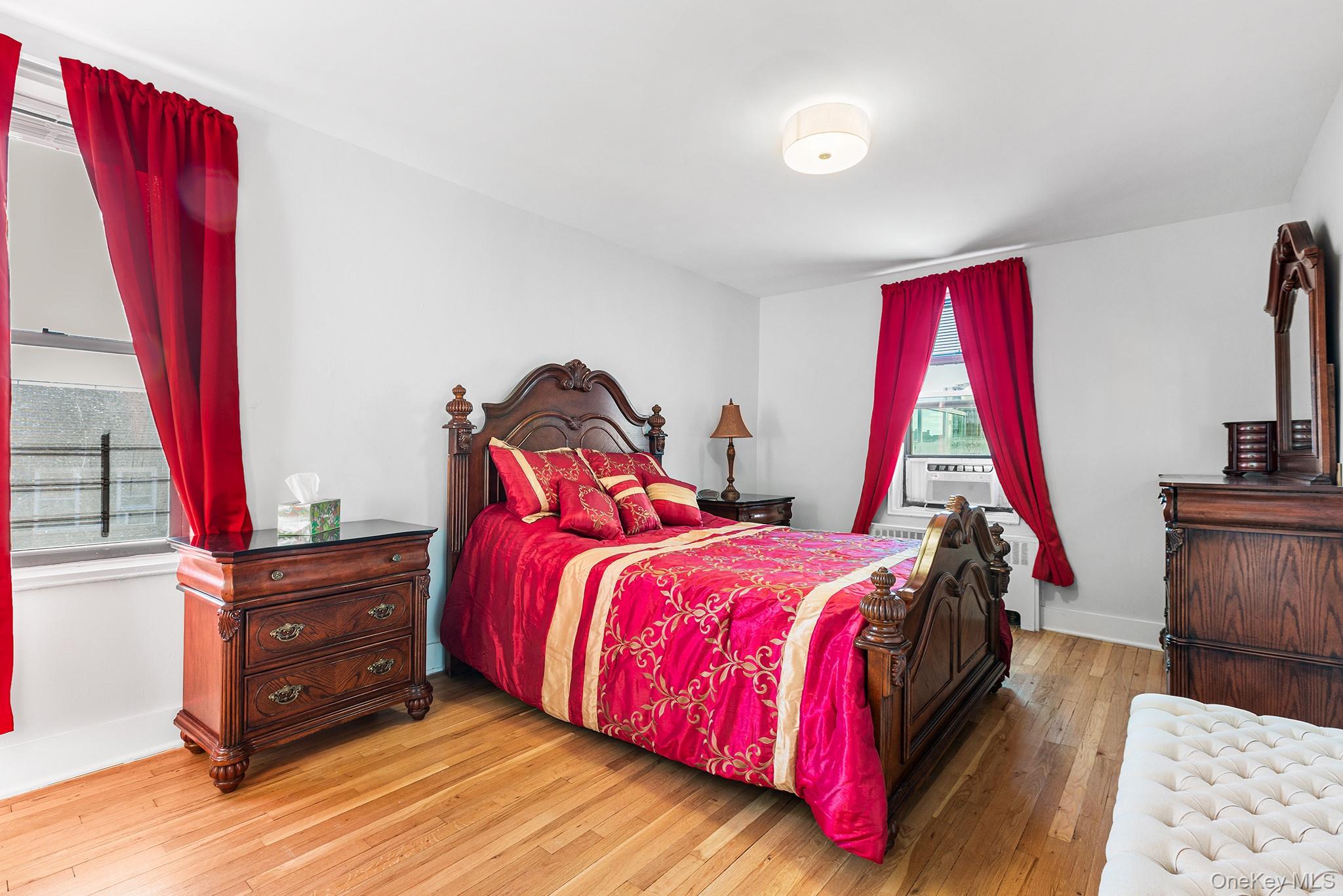 525 West 235th Street, Unit 7E Bronx, NY 10463 - Photo 10 of 14 a bed room with a bed and a window