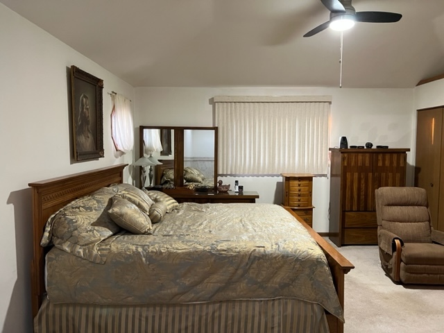 30 Red Barn Road Matteson, IL 60443 - Photo 23 of 34 a bedroom with a bed and couch