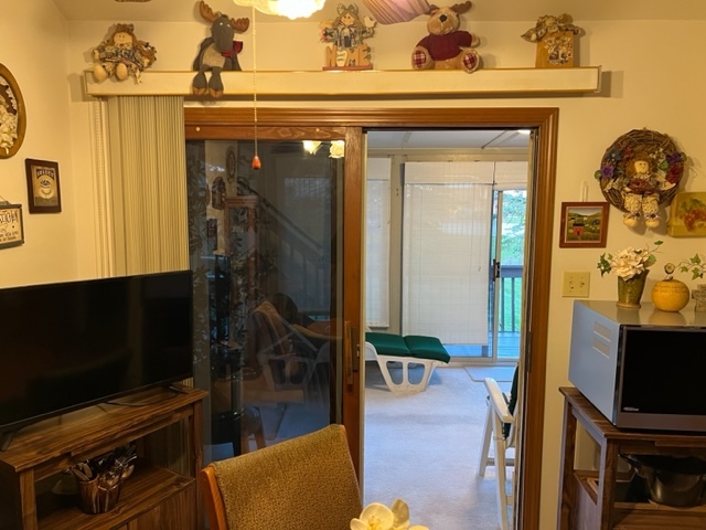 30 Red Barn Road Matteson, IL 60443 - Photo 9 of 34 a living room with furniture and a flat screen tv