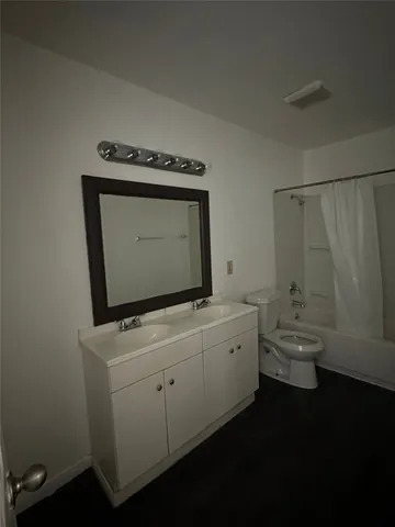 an empty room with closet area