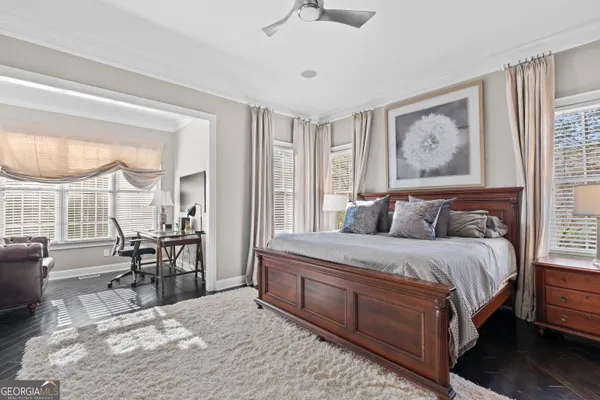 a bed room with a bed and a table