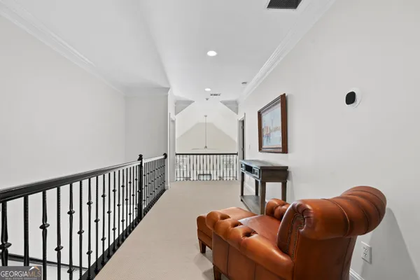 a bedroom with a bed and ceiling fan