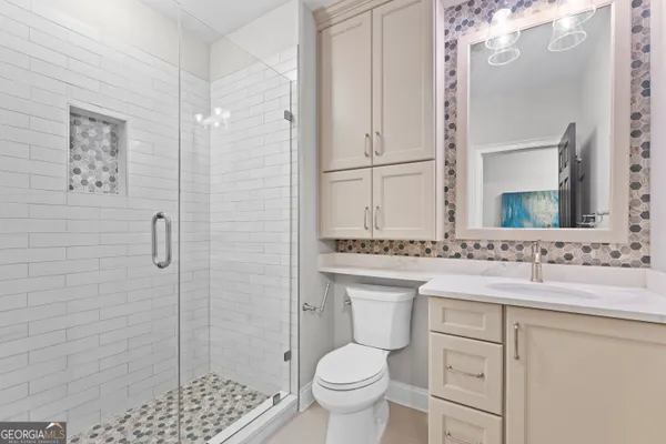 a dining room with furniture window and wooden floor