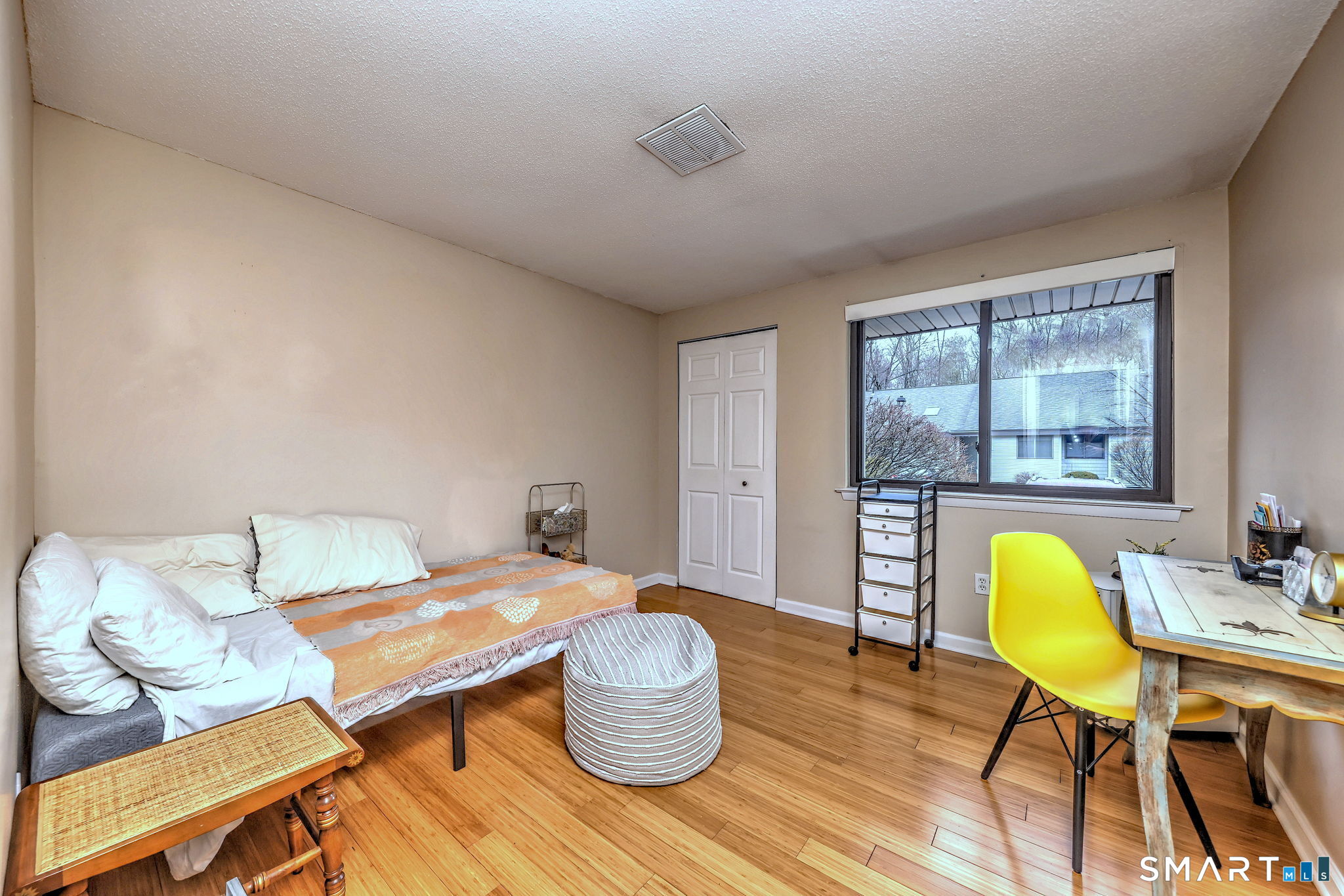 55 Dowd Avenue, Unit 22 Canton, CT 06019 - Photo 14 of 29 a living room with furniture and a wooden floor