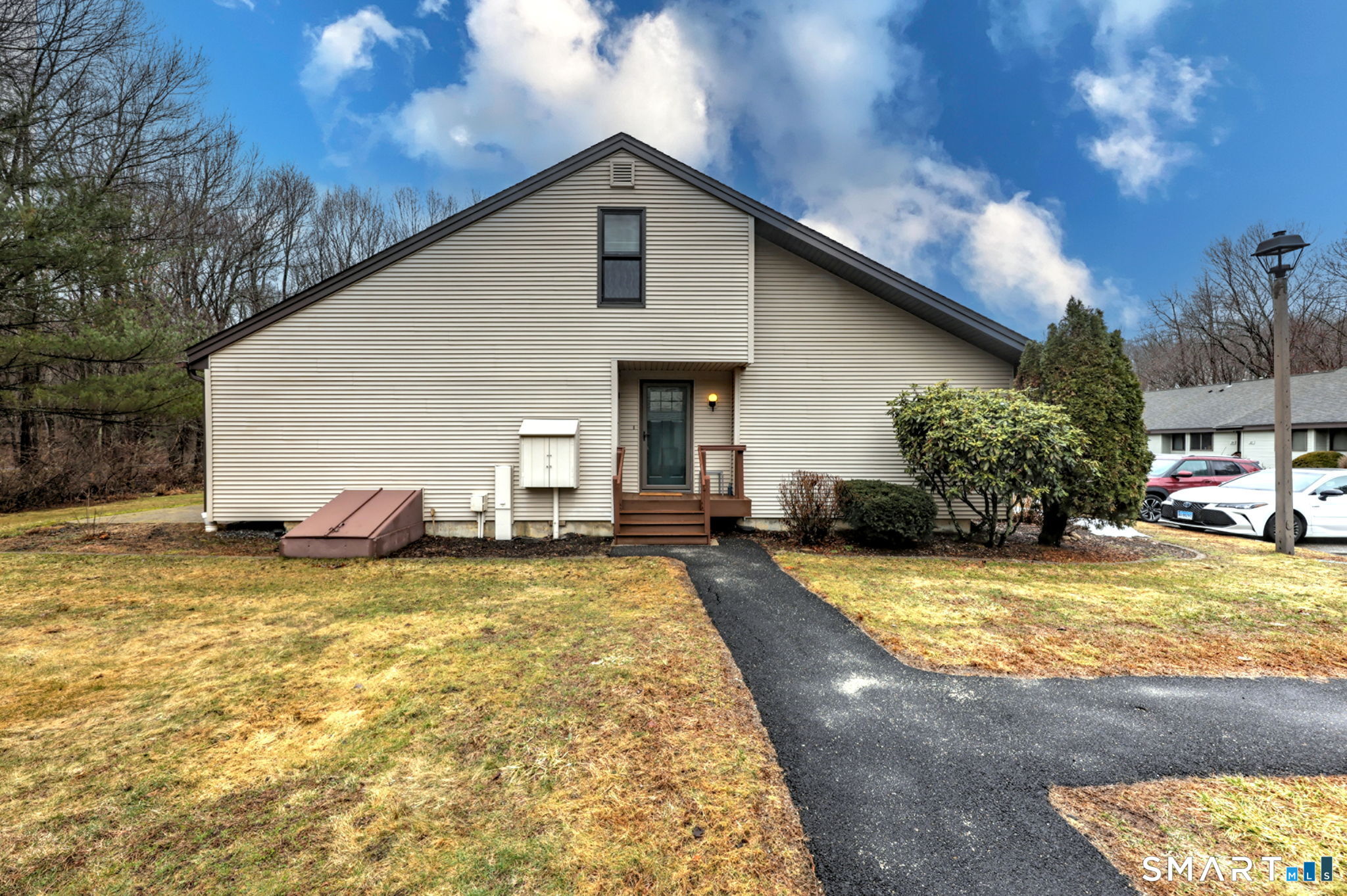 55 Dowd Avenue, Unit 22 Canton, CT 06019 - Photo 19 of 29 a view of a house with swimming pool and sitting area