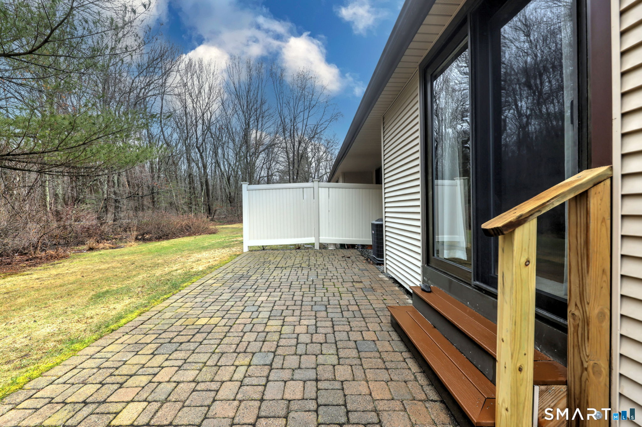 55 Dowd Avenue, Unit 22 Canton, CT 06019 - Photo 23 of 29 a view of a backyard of the house