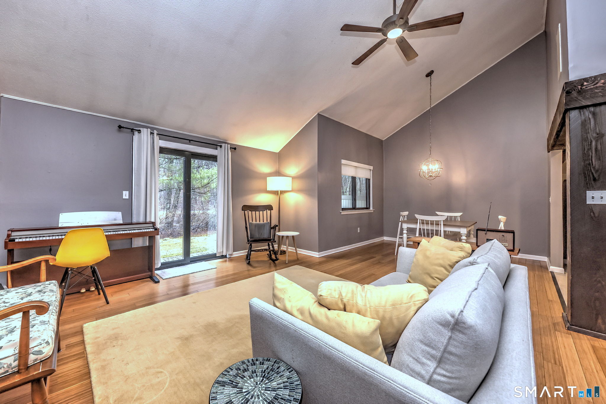 55 Dowd Avenue, Unit 22 Canton, CT 06019 - Photo 5 of 29 a living room with furniture and a rug