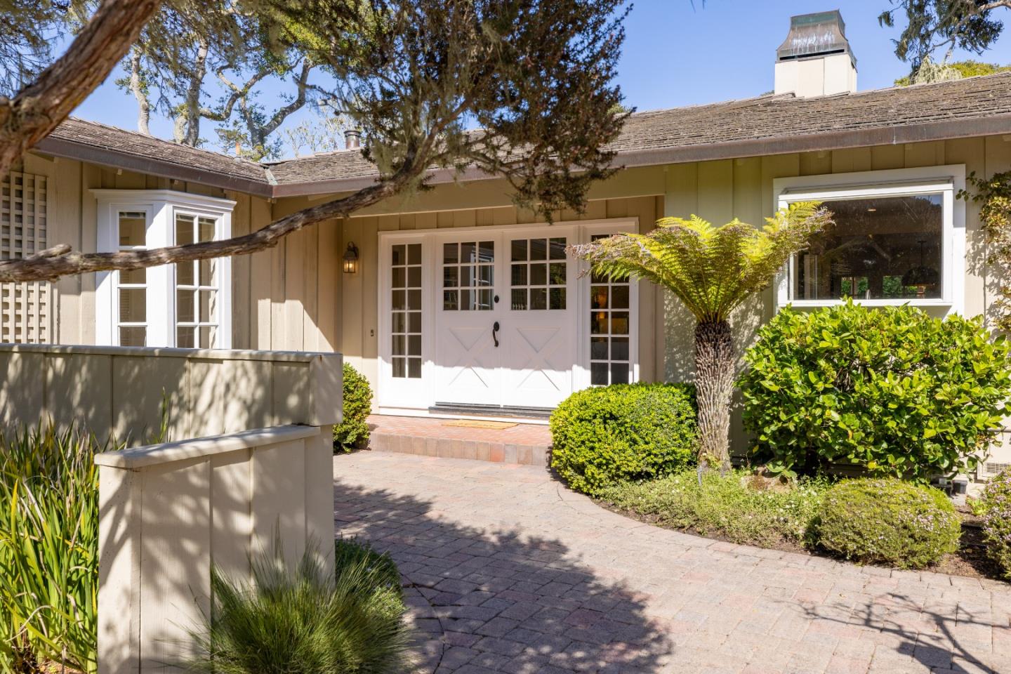 3085 Valdez Road Pebble Beach, CA 93953 - Photo 3 of 26 front view of a house with a yard