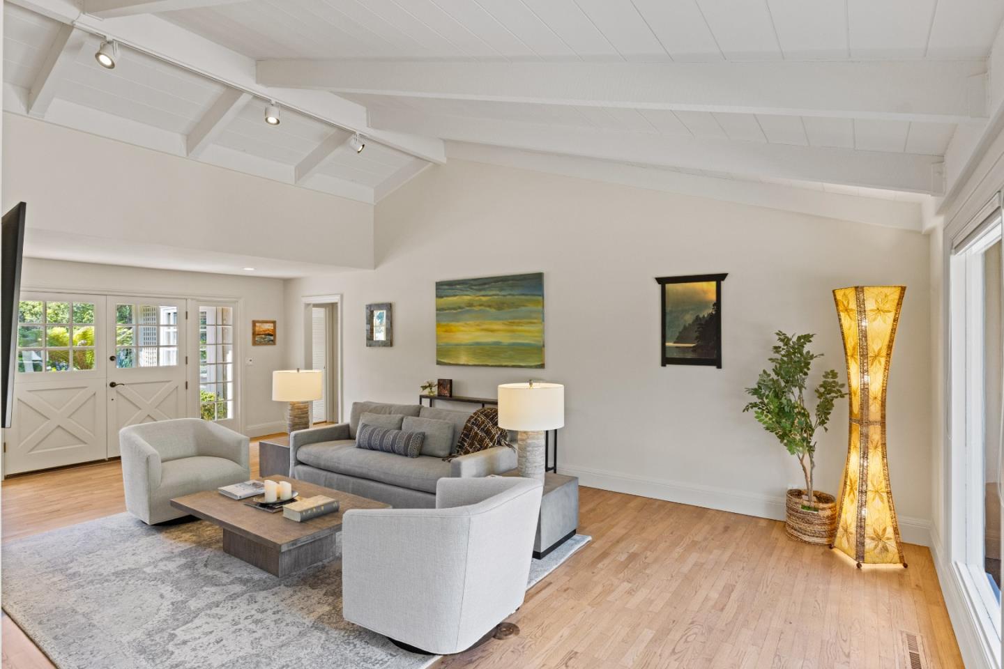 3085 Valdez Road Pebble Beach, CA 93953 - Photo 5 of 26 a living room with furniture and a wooden floor