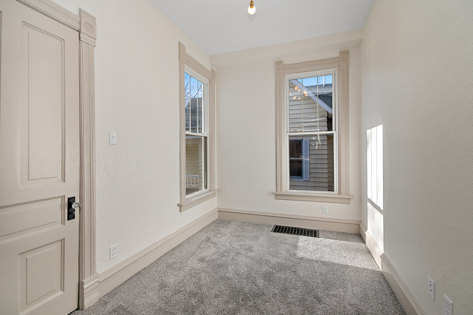 505 South Indiana Avenue Kankakee, IL 60901 - Photo 21 of 32 a view of an empty room with a window