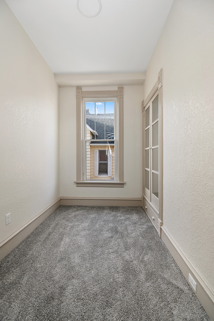 505 South Indiana Avenue Kankakee, IL 60901 - Photo 23 of 32 a view of an empty room with a window