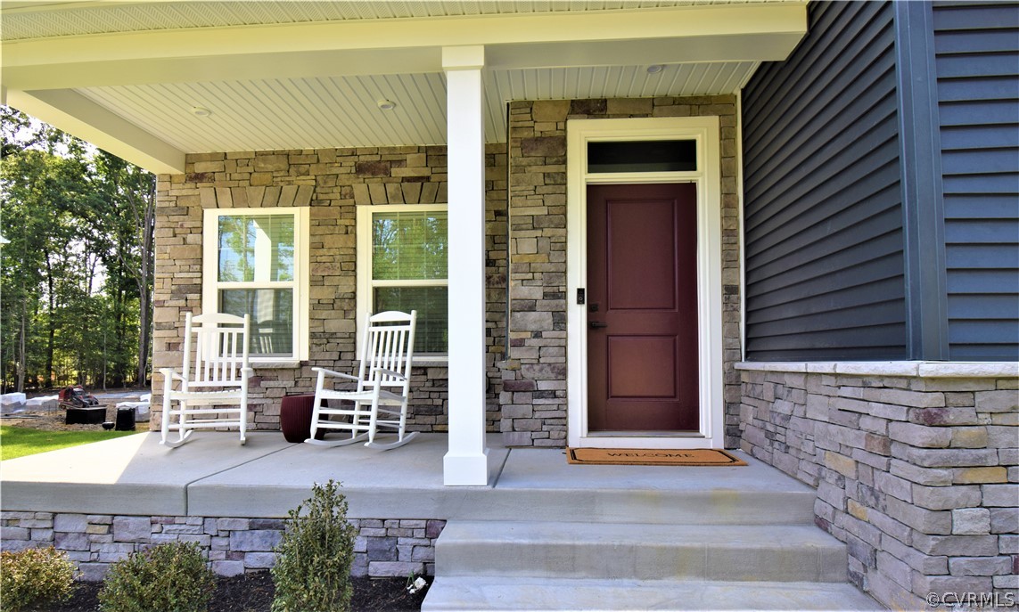 13931 Marsham Road Chester, VA 23836 - Photo 3 of 29 a front view of a house with a yard
