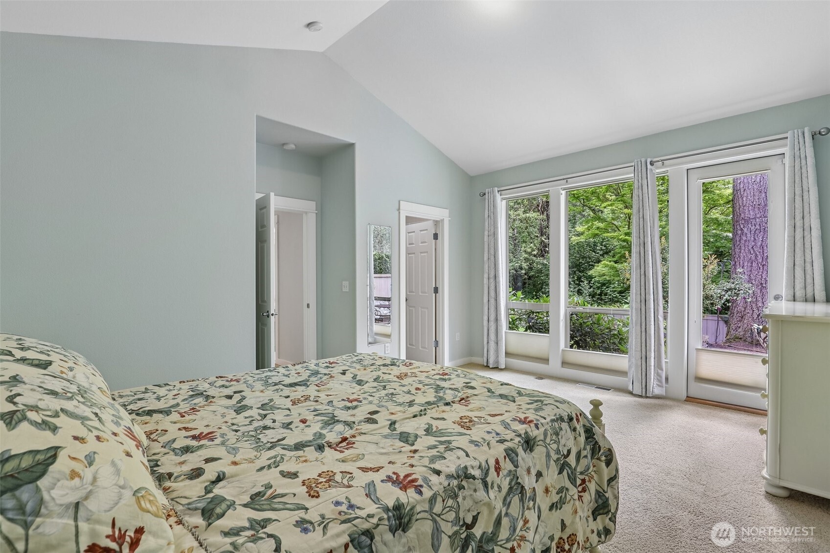 19709 Southeast 26th Way Camas, WA 98607 - Photo 22 of 36 a bedroom with a bed and a large window