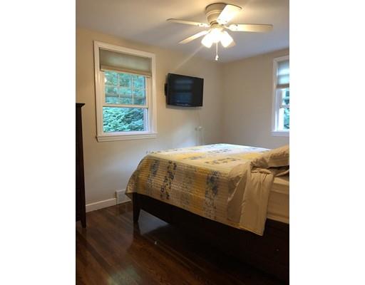 31 Ward Well Road Canton, MA 02021 - Photo 13 of 25 a bedroom with a bed and a flat screen tv