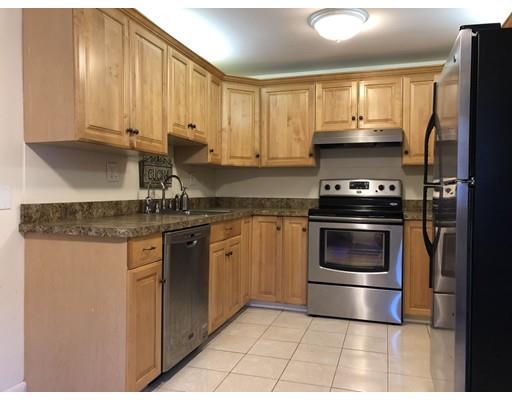 31 Ward Well Road Canton, MA 02021 - Photo 20 of 25 a kitchen with a stove and a refrigerator