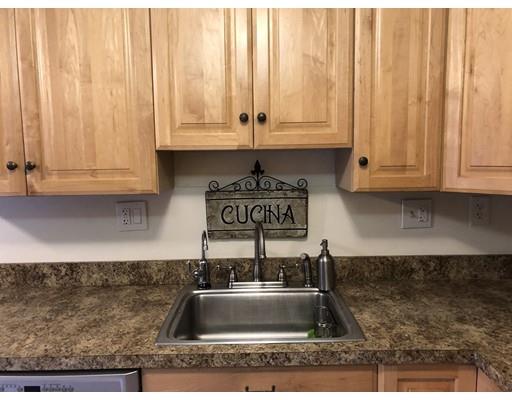 31 Ward Well Road Canton, MA 02021 - Photo 22 of 25 a kitchen with a sink and cabinets