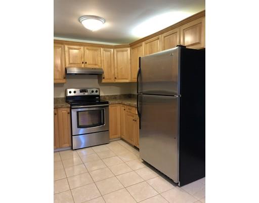 31 Ward Well Road Canton, MA 02021 - Photo 23 of 25 a kitchen with stainless steel appliances granite countertop a refrigerator and a sink