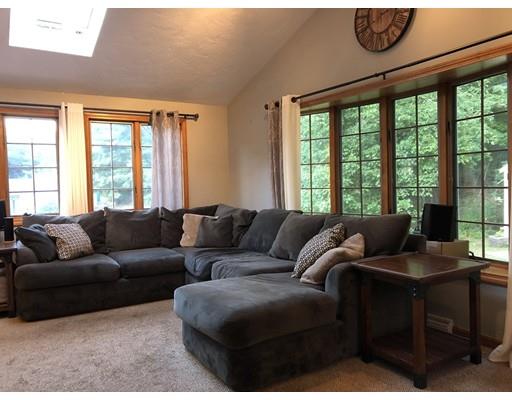 31 Ward Well Road Canton, MA 02021 - Photo 7 of 25 a living room with furniture and a floor to ceiling window