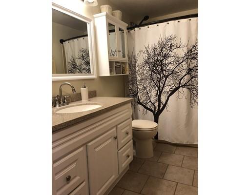 31 Ward Well Road Canton, MA 02021 - Photo 9 of 25 a bathroom with a sink toilet and shower