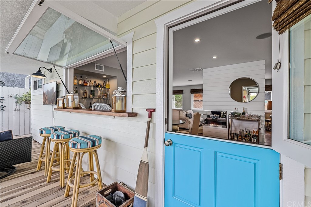 C-29 Surfside Avenue Surfside, CA 90743 - Photo 17 of 36 a bathroom with a sink mirror and vanity