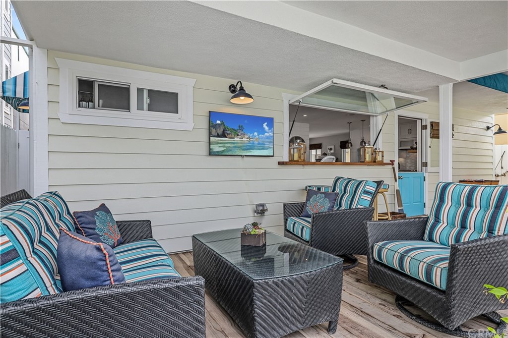 C-29 Surfside Avenue Surfside, CA 90743 - Photo 19 of 36 a living room with furniture and a painting