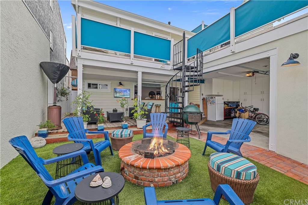 C-29 Surfside Avenue Surfside, CA 90743 - Photo 21 of 36 a patio with a table and chairs