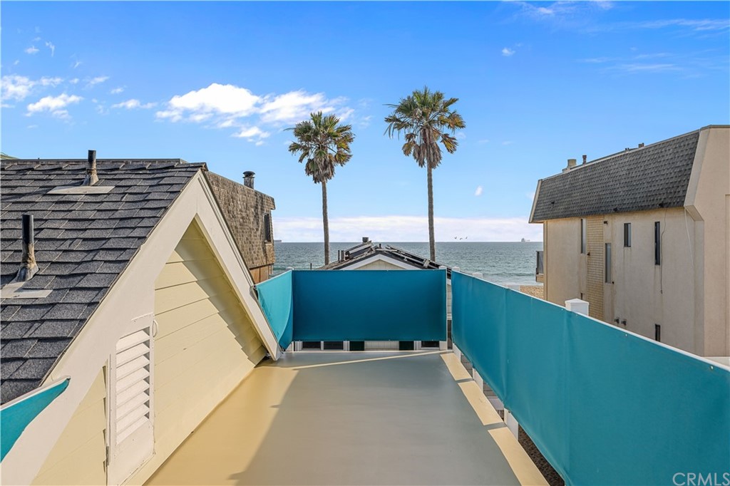 C-29 Surfside Avenue Surfside, CA 90743 - Photo 33 of 36 a view of outdoor space and front view of a house