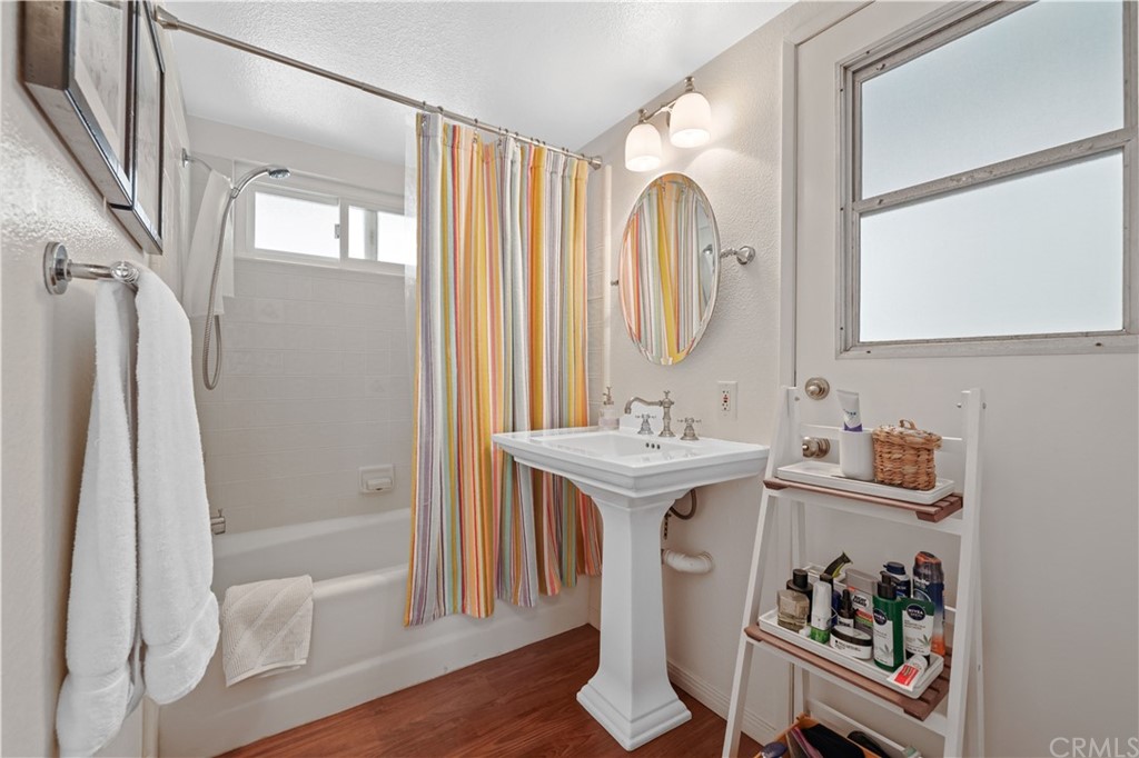 C-29 Surfside Avenue Surfside, CA 90743 - Photo 6 of 36 a bathroom with a sink and a mirror